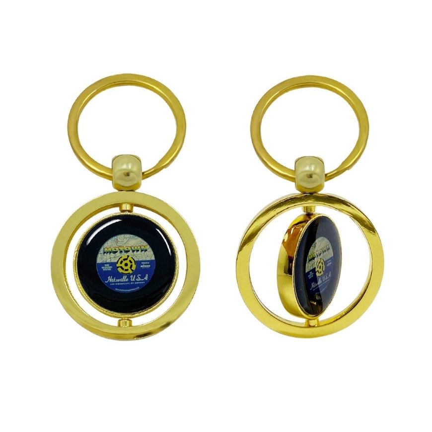 Gold spinning vinyl record keychain with epoxy dome logo, ideal for music merchandise and promotional gift wholesale.