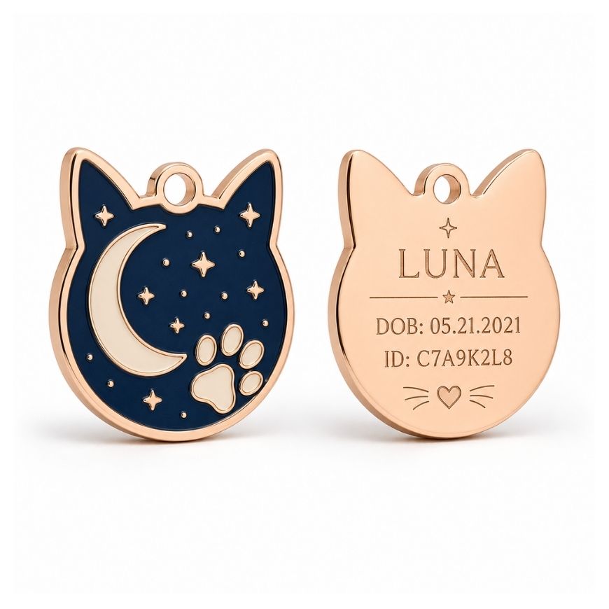 Rose gold cat-head ID tag with enamel crescent moon design and custom back engraving for pet accessory suppliers.
