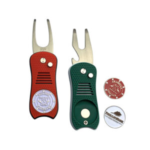 red and green golf divot tool and ball markers