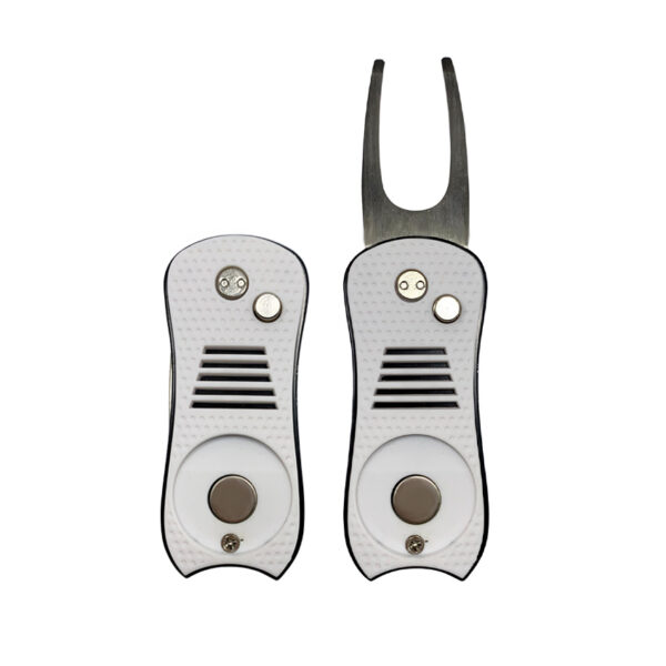 a white foldable divot tool