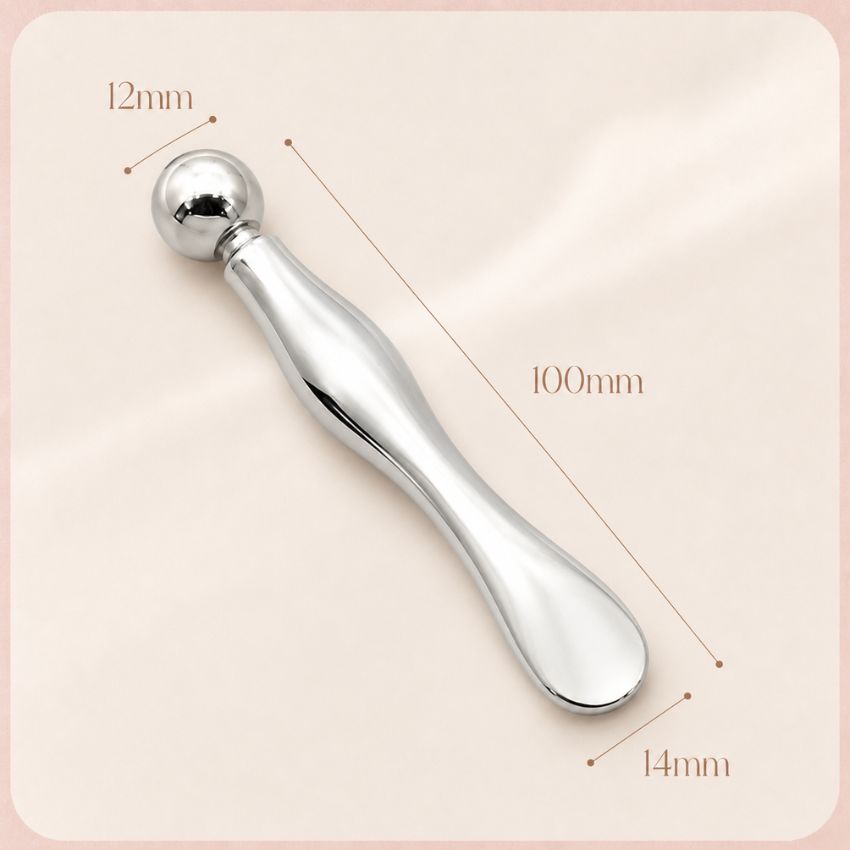 Ergonomic silver metal eye roller massager, 100mm skincare tool for anti-aging and facial lifting.
