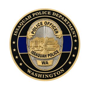 Custom Issaquah Police Department challenge coin with gold badge emblem and thin blue line background.