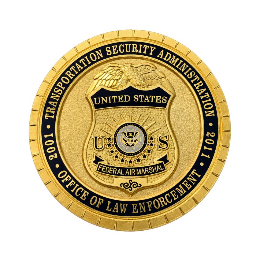 Gold Federal Air Marshal Service custom challenge coin representing TSA Office of Law Enforcement.