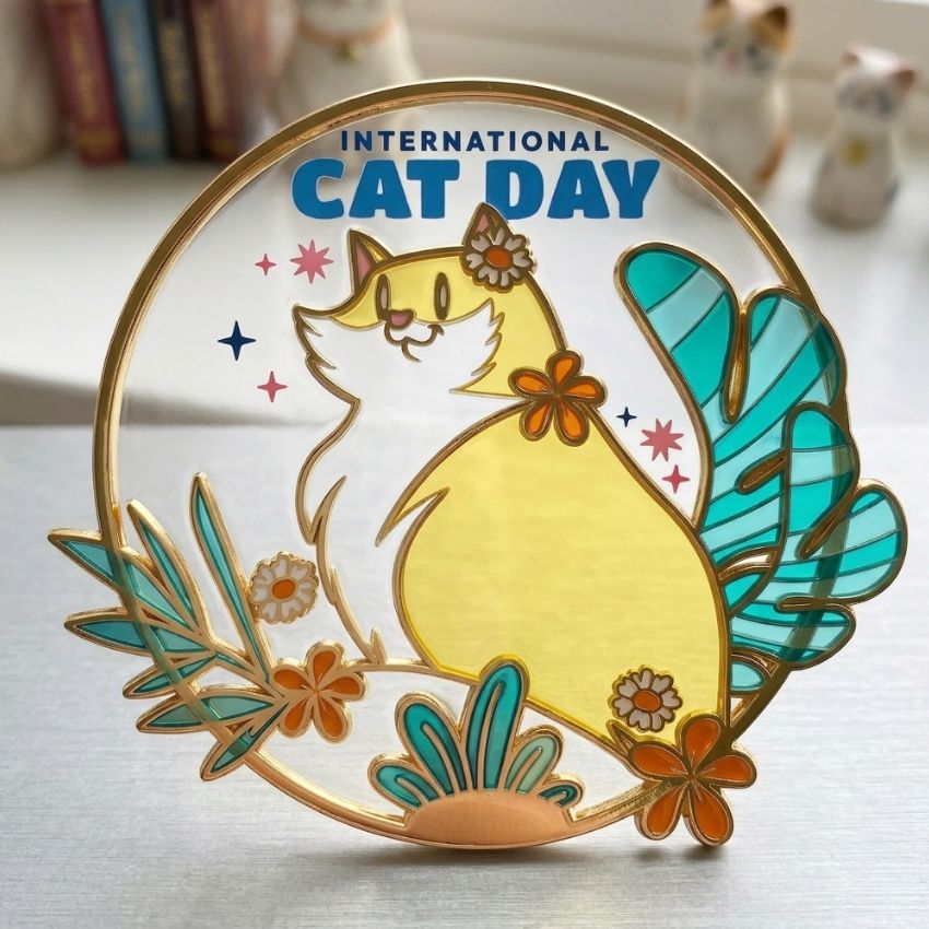 Custom International Cat Day metal ornament made of translucent soft enamel with detailed UV printed graphics.