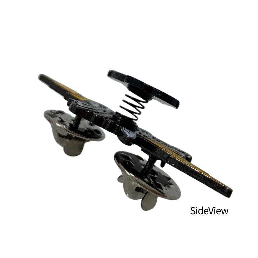 Close-up side view of a spring-loaded interactive enamel pin attachment showing double spur clutches for custom badge order.