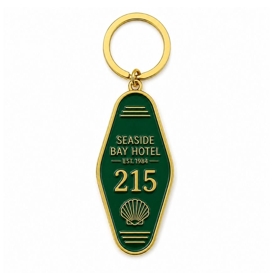 Custom green enamel vintage motel keychain with gold seashell motif, suitable for boutique hotel promotional items.