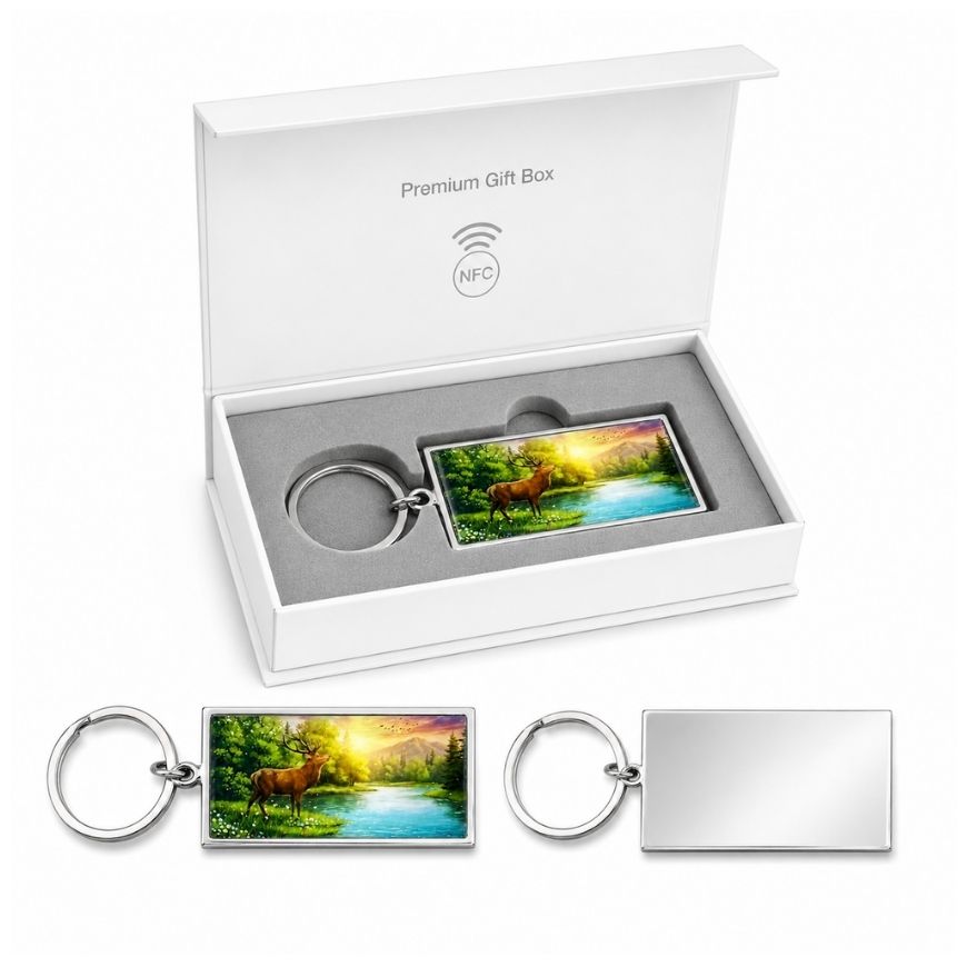 Custom NFC metal keychain with deer artwork presented in a premium white gift box for corporate gifts.