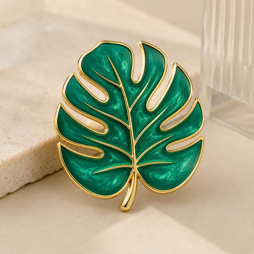 Monstera leaf green enamel pin with gold finish, botanical custom lapel pin wholesale.