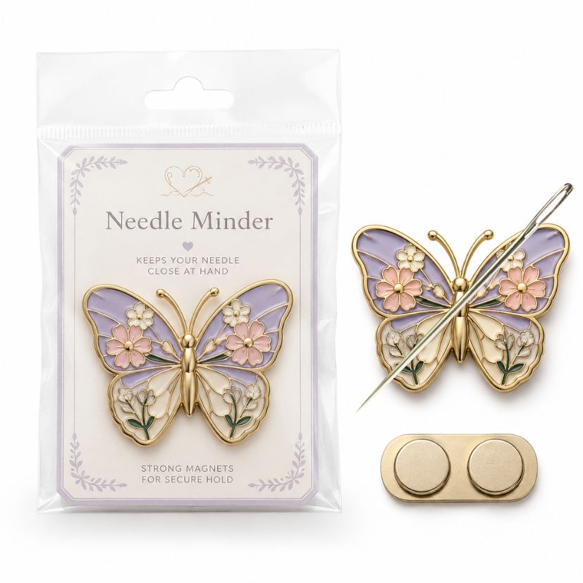 Purple butterfly enamel needle minder packaged with backing card and double magnetic back for embroidery wholesale.