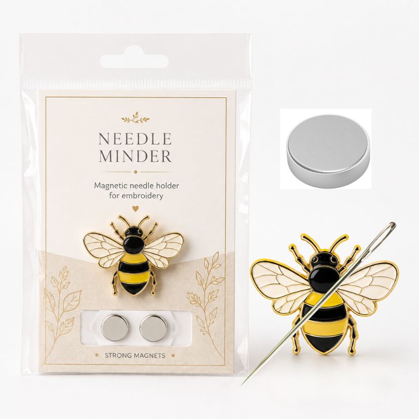 Bumblebee hard enamel needle minder displayed with backing card packaging and magnets for craft store wholesale.